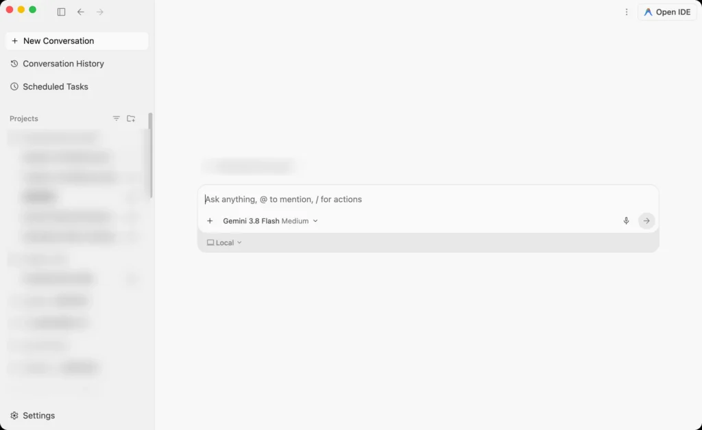 Antigravity 2.0 的畫面,左欄有 New Conversation、Conversation History、Scheduled Tasks 和 Projects,右上角有 Open IDE 按鈕,中間是新對話的輸入框